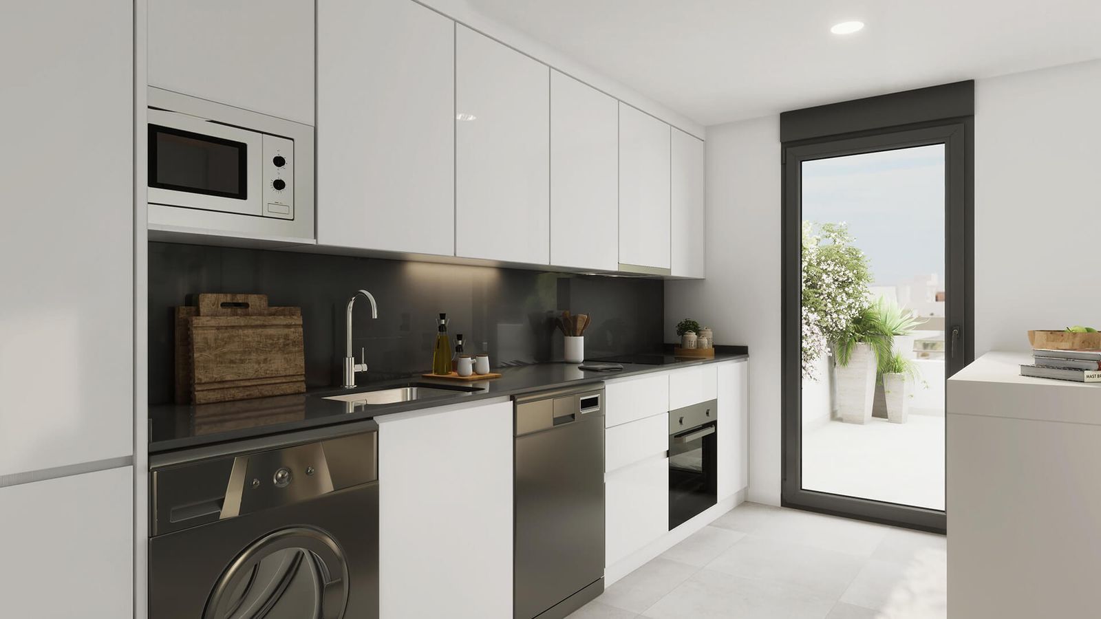 Moderne keuken met uitzicht op het balkon.